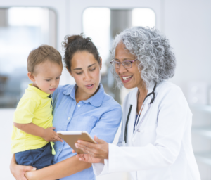 Parent and child with doctor